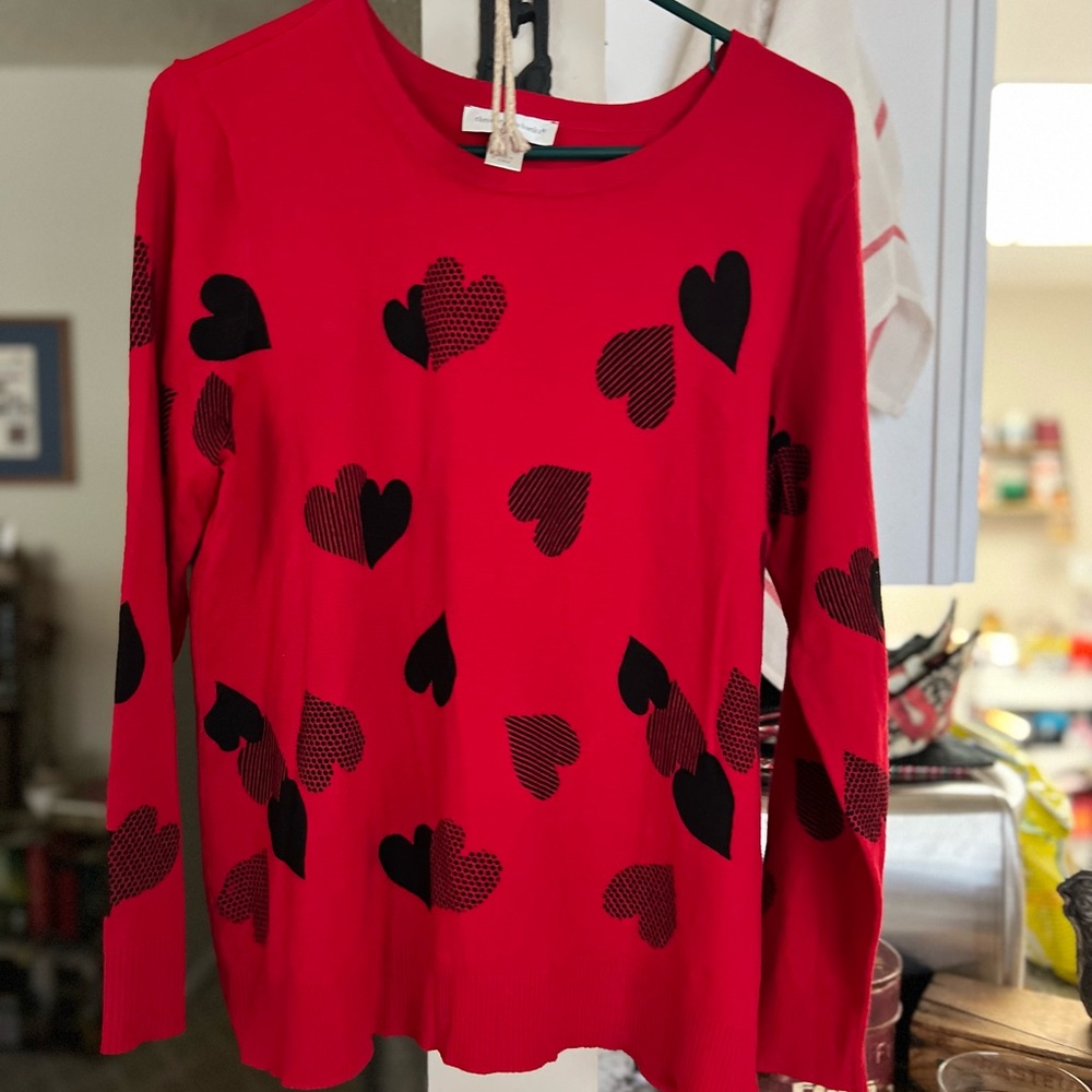 New with Tags size Large Heart sweater.